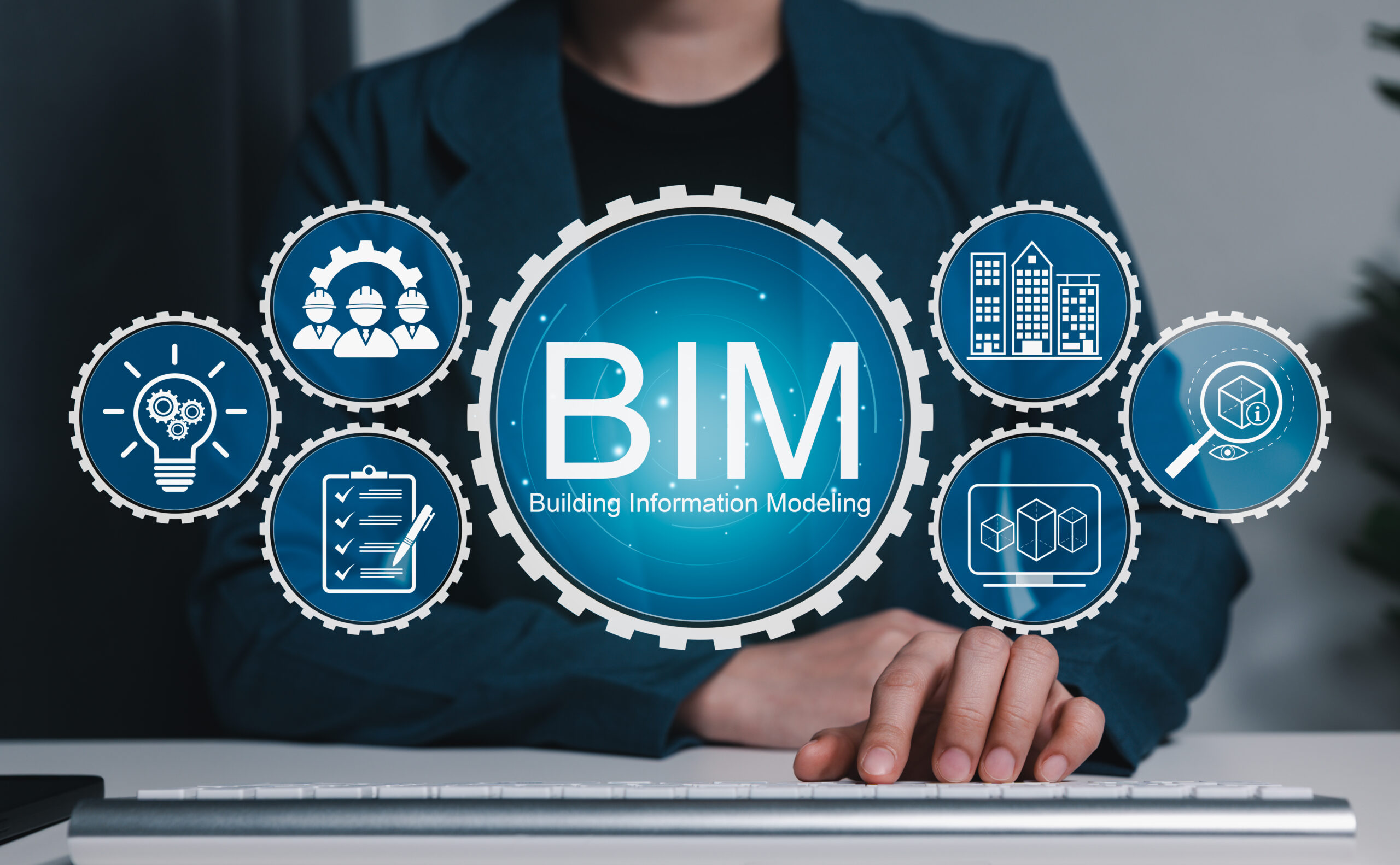 BIM の文字と図のアイコンとキーボードを打つ手元
